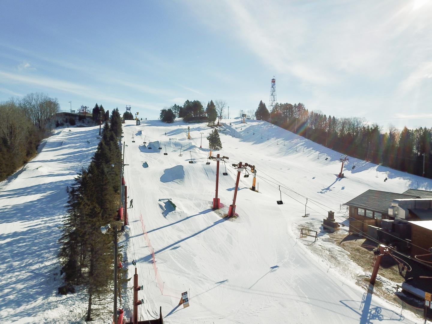 aerial shot of terrain park on ski hill