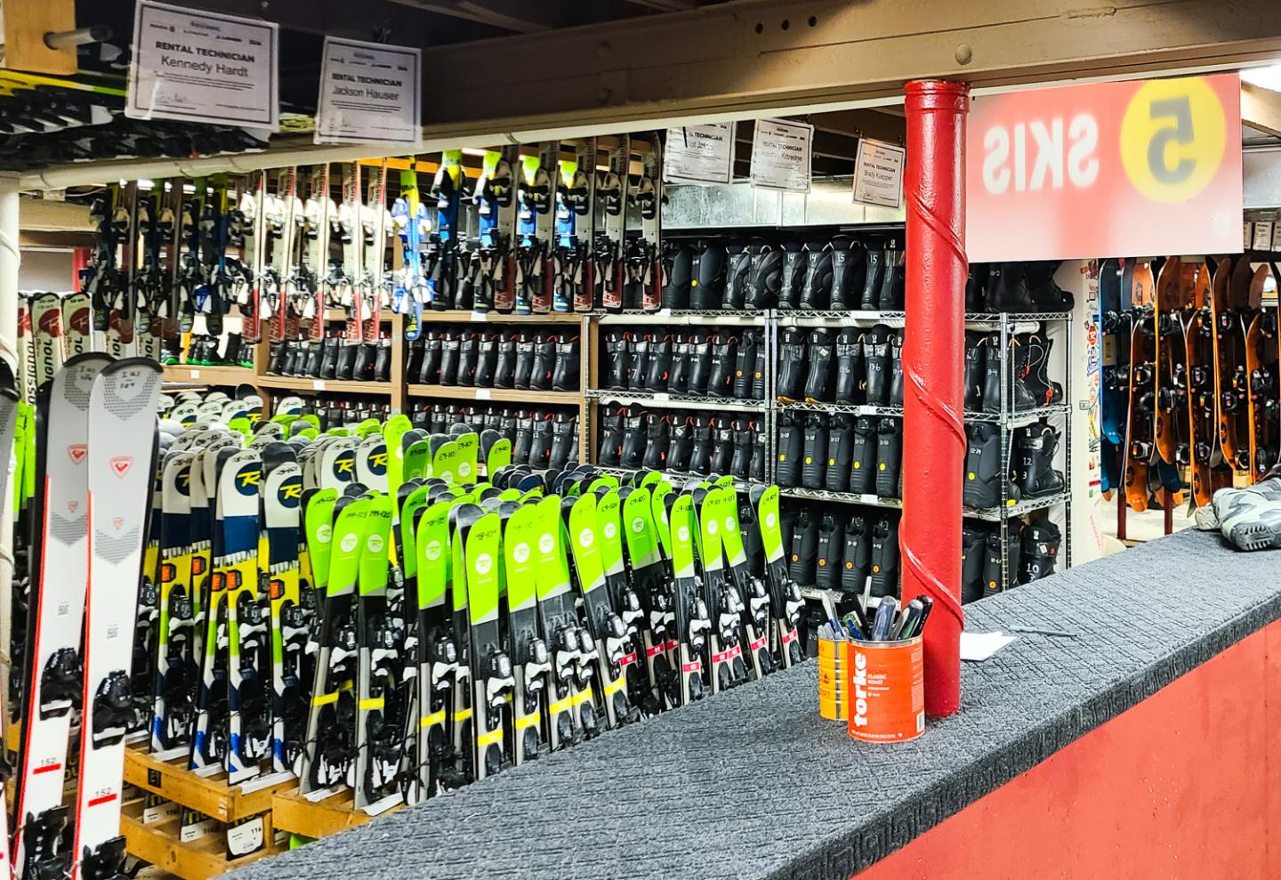 behind the counter in ski rental shop