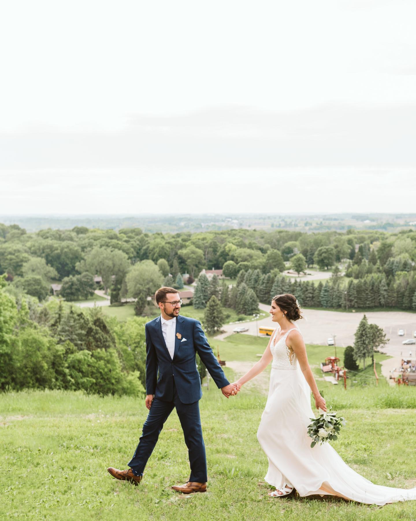 Wedding Couple Walking on the Hill