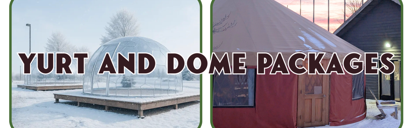 Transparent dome and red yurt in snowy landscape.