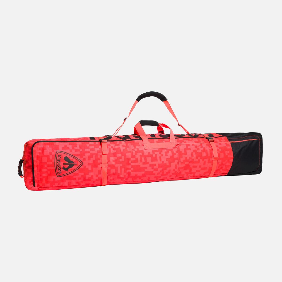 Bright red ski bag with black accents and a carrying handle.